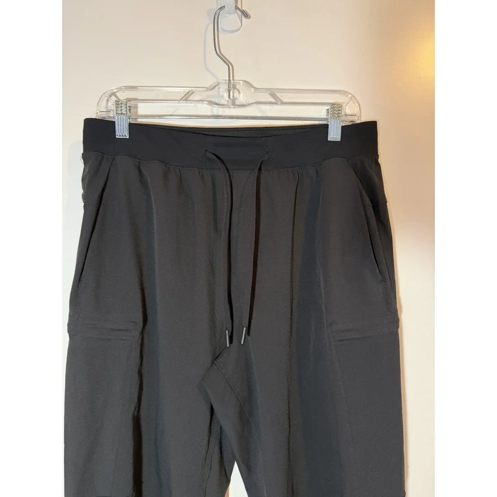 Lululemon Mens M Black Jogger Pants Drawstring Zip Pocket Tapered Athletic Sport